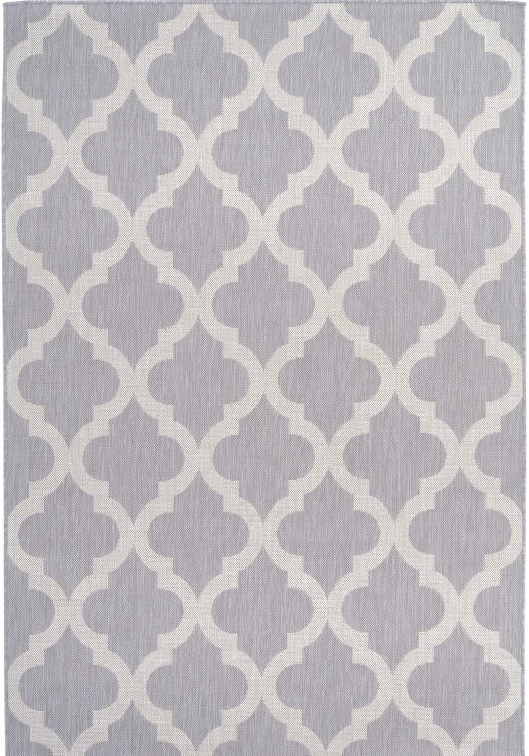 Grey Moroccan trellis outdoor rug on a British garden patio