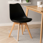 Stockholm Dining Chair | Black Moulded Dining Chair with Faux Leather Seat and Splayed Wood Legs