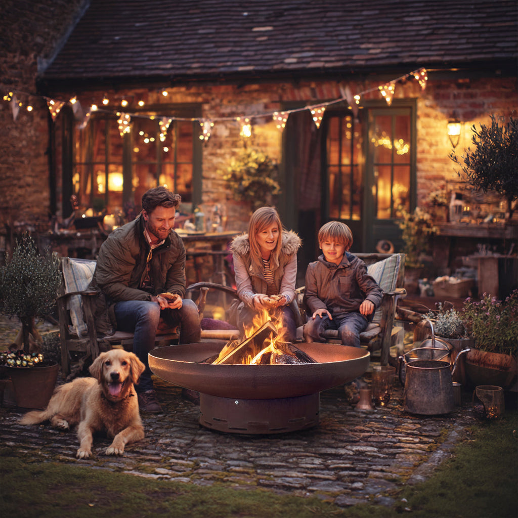 Corten steel fire pit product render showing the stand and base detail