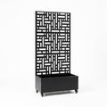 Black metal privacy screen with planter box, front view showing geometric design